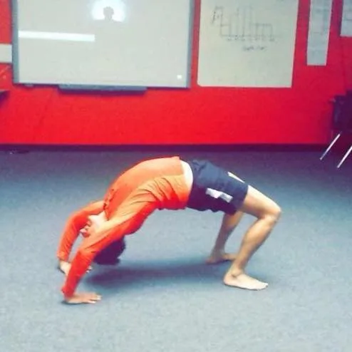 Cakrasana demonstration at an afterschool program